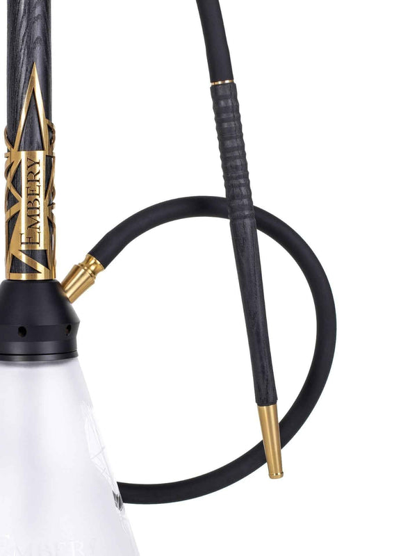 Modern black and gold hookah with engraved details and frosted glass base