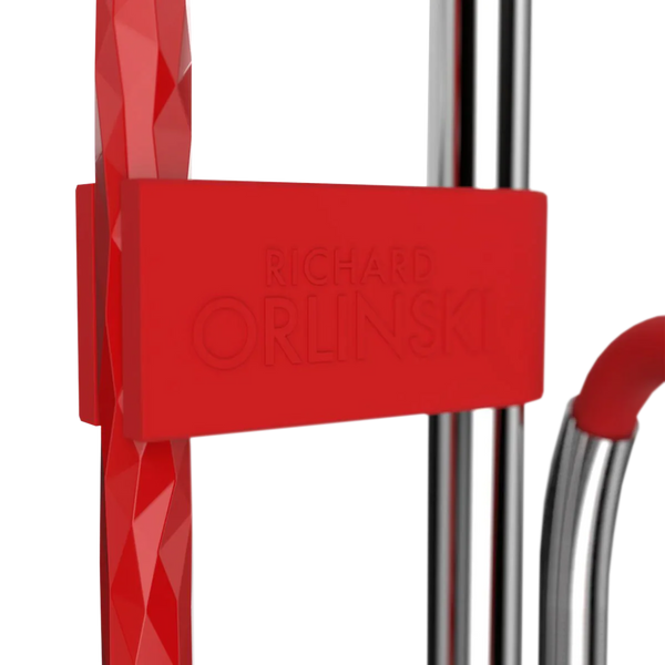 Close-up of a modern red and chrome shisha pipe with geometric patterns and Richard Orlinski branding
