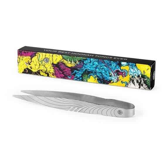 Stainless steel hookah tongs with engraved design next to a colorful decorative box