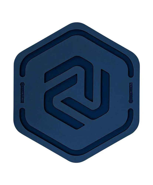 Hexagonal navy blue silicone coaster with geometric groove design