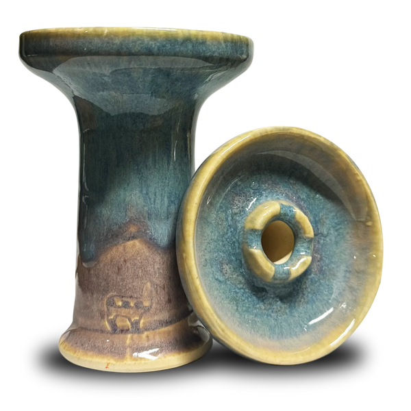 Ceramic hookah bowl with blue and beige glaze, phunnel style design, isolated on black.