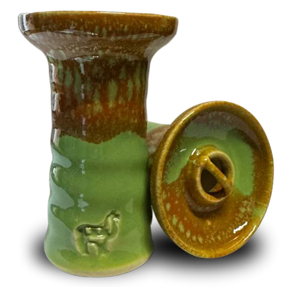 Ceramic hookah bowl with green and brown glaze, camel design on base, two views shown