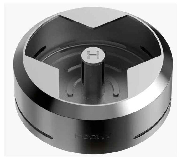 Modern metal shisha heat management device with sleek design and ventilation slots.