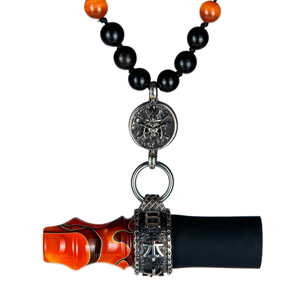 Personal hookah mouthpiece with orange and black beads, samurai-themed metal charm and accents.