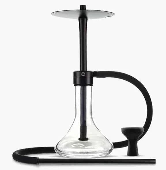 Modern black hookah with clear glass base, silicone hose, and metal stem on white background