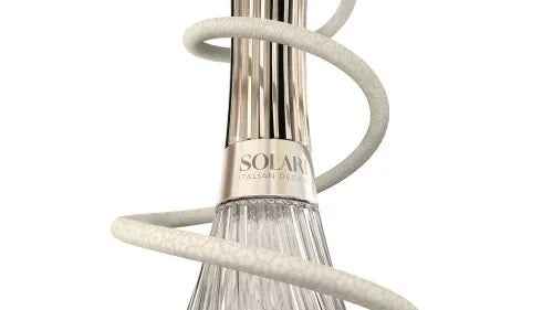 Modern shisha pipe with a clear glass base, silver stem, and white hose wrapped around neck