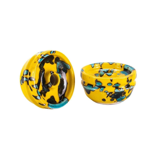 Yellow and blue ceramic hookah bowl with speckled pattern, phunnel design on white background
