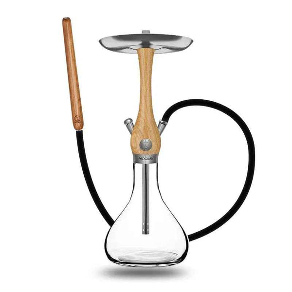 Modern glass and wood hookah set with metal tray and black hose on white background