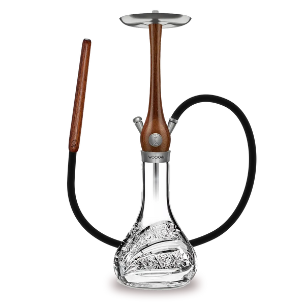 Elegant hookah with carved crystal glass base, wood stem, and black hose on white background