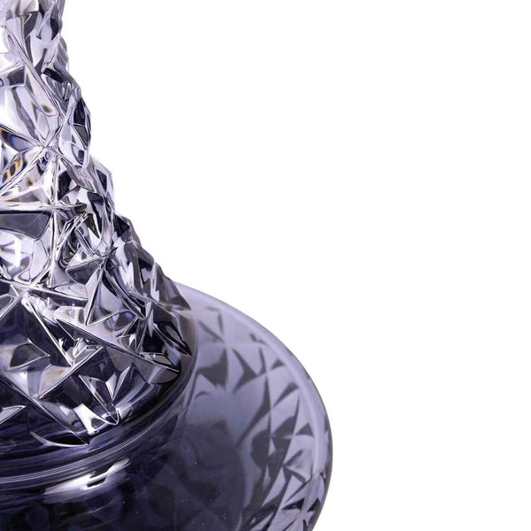 Close-up of grey hookah glass bowl with geometric cut design and reflective finish