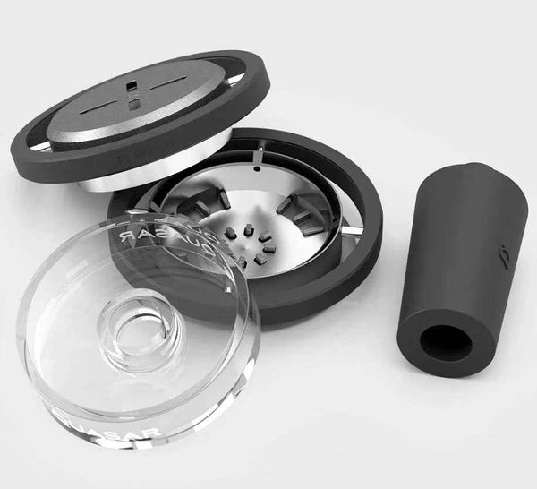 Modern shisha bowl set with clear glass and black silicone parts on a light background