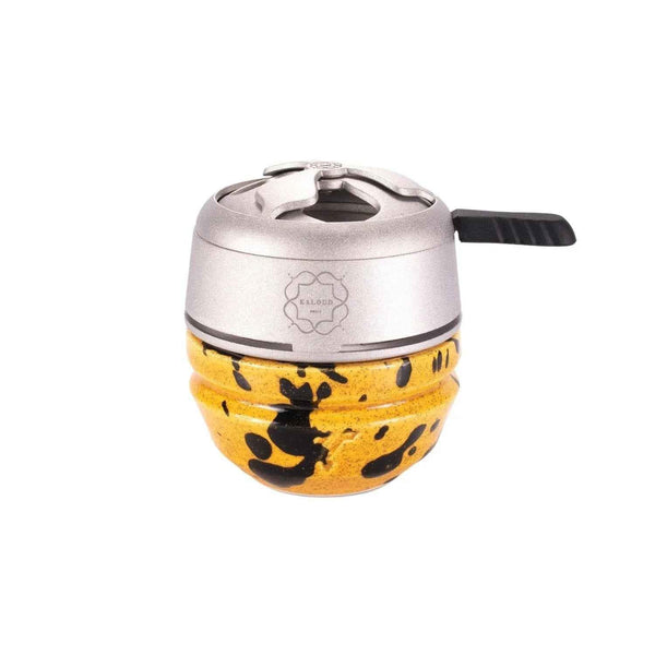 Yellow and black hookah phunnel bowl with silver heat management device on white background