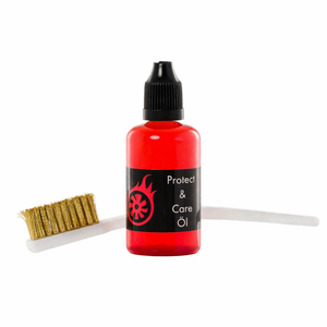 Shisha care oil bottle and cleaning brush for hookah maintenance on white background